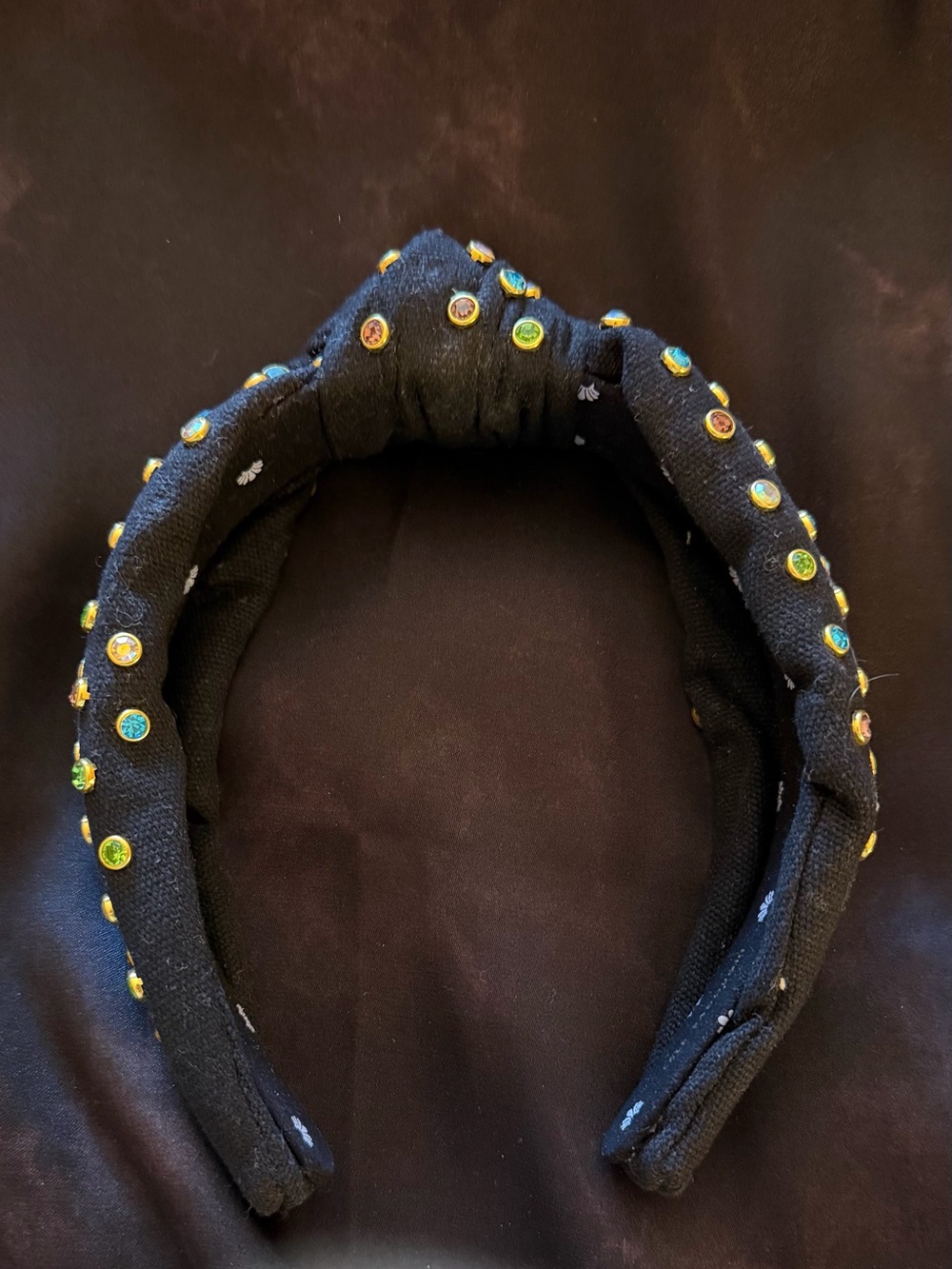LELE SADOUGHI black cotton with rainbow colored crystals in gold tone mountings